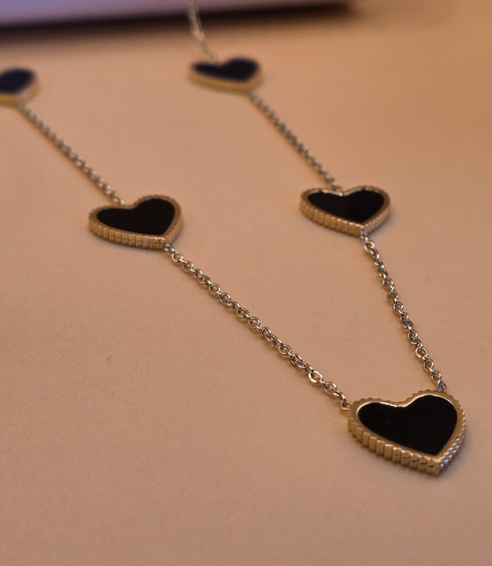 Parure collier, bracelet et boucles d'oreilles cœur noir